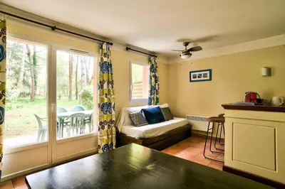 Coin salon dans l'établissement Les Maisons du Domaine du Golf de Pinsolle - maeva Home - Maison 3 pièces 6 personnes - Sélection MAE-0324