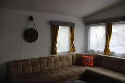 Coin salon dans l'établissement MH481 spatieux 8pers - BRUME