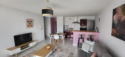 Télévision ou salle de divertissement dans l'établissement Appartement Lit et Mixe