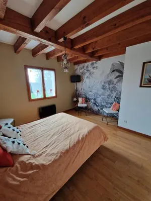 Un ou plusieurs lits dans un hébergement de l'établissement Grande maison familiale
