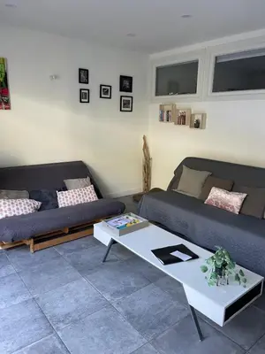 Coin salon dans l'établissement Landes Appart