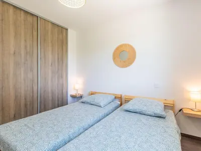 Un ou plusieurs lits dans un hébergement de l'établissement Holiday Home Les Fougères by Interhome