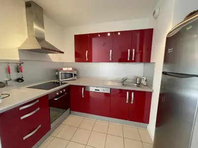 Cuisine ou kitchenette dans l'établissement Les Tourterelles