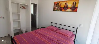 Un ou plusieurs lits dans un hébergement de l'établissement chambre au pied de la forêt