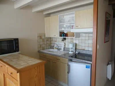 Cuisine ou kitchenette dans l'établissement L'Abri Côtier