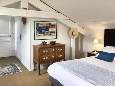 Un ou plusieurs lits dans un hébergement de l'établissement Chambres d’hôtes la guirosse