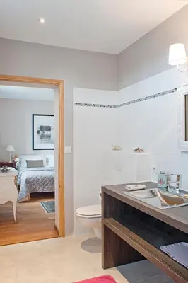 Un ou plusieurs lits dans un hébergement de l'établissement Chambres d’hôtes la guirosse