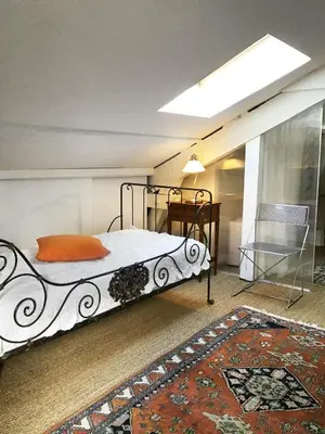 Un ou plusieurs lits dans un hébergement de l'établissement Chambres d’hôtes la guirosse