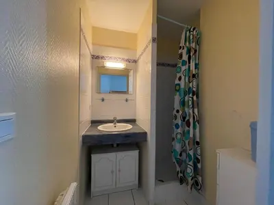Salle de bains dans l'établissement Le Bruit Des Vagues