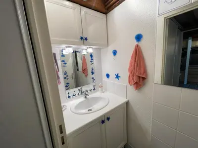 Salle de bains dans l'établissement Les Landaises