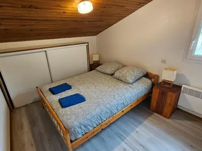 Un ou plusieurs lits dans un hébergement de l'établissement Maison abelias soustons plage