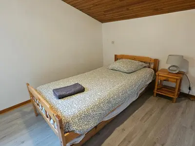Un ou plusieurs lits dans un hébergement de l'établissement Maison abelias soustons plage