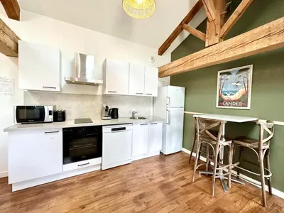 Cuisine ou kitchenette dans l'établissement Le Petit Landais - Chaleureux - Clim - Central