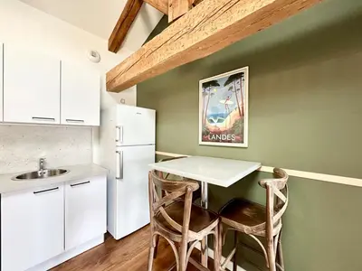 Cuisine ou kitchenette dans l'établissement Le Petit Landais - Chaleureux - Clim - Central