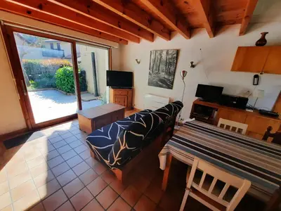 Télévision ou salle de divertissement dans l'établissement Villa confortable à Seignosse : plage, commerces et piste cyclable à proximité - FR-1-239-771