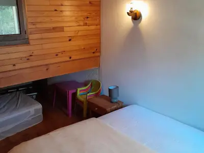 Un ou plusieurs lits dans un hébergement de l'établissement Villa confortable à Seignosse : plage, commerces et piste cyclable à proximité - FR-1-239-771