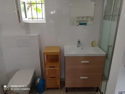 Salle de bains dans l'établissement Studio Gujan-mestras