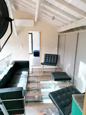 Coin salon dans l'établissement Maison de charme à Mézos avec jardin et terrasse