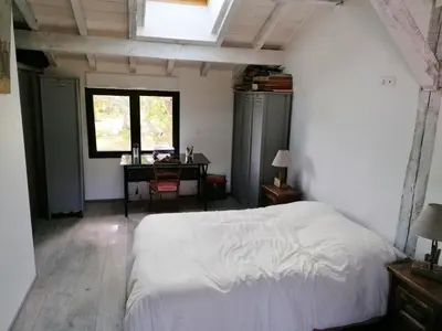Un ou plusieurs lits dans un hébergement de l'établissement Maison de charme à Mézos avec jardin et terrasse