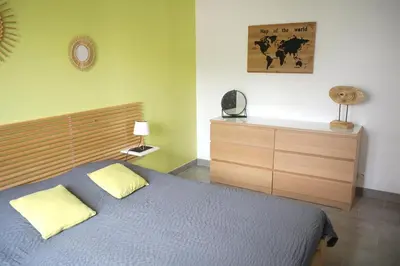 Un ou plusieurs lits dans un hébergement de l'établissement Maison 4 personnes tout confort à 300m de la plage - Clim & Wifi