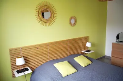 Un ou plusieurs lits dans un hébergement de l'établissement Maison 4 personnes tout confort à 300m de la plage - Clim & Wifi