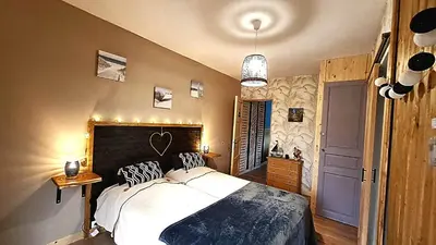 Un ou plusieurs lits dans un hébergement de l'établissement Les Bord'Océanes Sauna & Spa Villa Marensine et Villa Oyat
