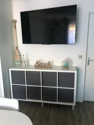 Télévision ou salle de divertissement dans l'établissement Villa de vacances Vieux Boucau