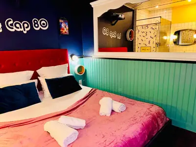 Un ou plusieurs lits dans un hébergement de l'établissement Le Cap 80 , La suite des nostalgiques chez Ivona Vacances