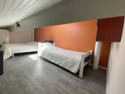 Un ou plusieurs lits dans un hébergement de l'établissement Capbreton Villa Patio 27m2 5 pers près port plages