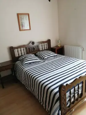 Un ou plusieurs lits dans un hébergement de l'établissement La maison du Barbot Maison 6 couchages