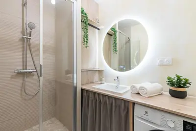 Salle de bains dans l'établissement Le Cœur de Ville - Unique