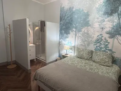 Un ou plusieurs lits dans un hébergement de l'établissement La Maison Florence