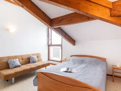 Un ou plusieurs lits dans un hébergement de l'établissement Apartment Belvédère 4 by Interhome