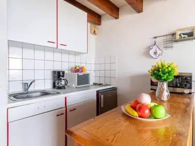 Cuisine ou kitchenette dans l'établissement Apartment Belvédère 4 by Interhome