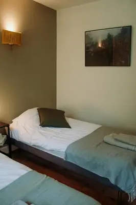 Un ou plusieurs lits dans un hébergement de l'établissement Les cabanes de l'océan, Villa confort proche plage sauvage