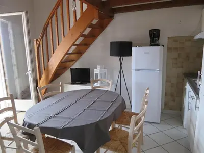 Cuisine ou kitchenette dans l'établissement Les Flots Bleus Etage