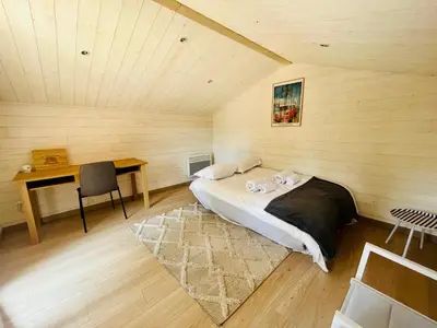 Un ou plusieurs lits dans un hébergement de l'établissement Chalet domaine forge 6-8pers jacuzzi terrasse plancha proche commerces