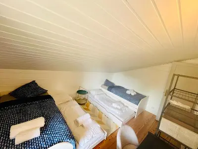 Un ou plusieurs lits dans un hébergement de l'établissement Chalet domaine forge 6-8pers jacuzzi terrasse plancha proche commerces