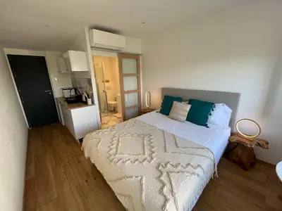 Un ou plusieurs lits dans un hébergement de l'établissement Home Place Apartments - Gujan Arcachon