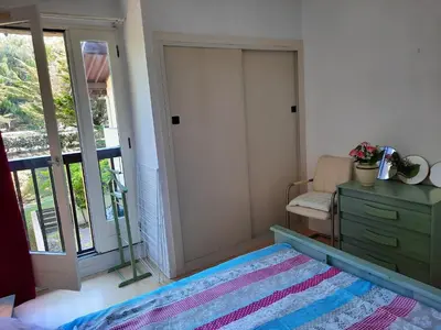Un ou plusieurs lits dans un hébergement de l'établissement Appartement Lumineux à Seignosse, Proche Plage, Commerces et Activités, Parking, Wifi et Balcon - FR-1-239-813