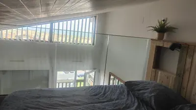 Un ou plusieurs lits dans un hébergement de l'établissement Splendide appartement vue océan le Penon