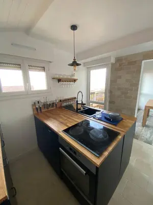 Cuisine ou kitchenette dans l'établissement Splendide appartement vue océan le Penon