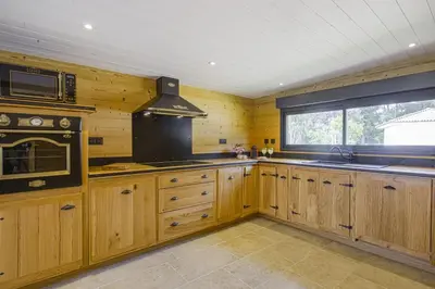 Cuisine ou kitchenette dans l'établissement Maison L'Atipik - Welkeys