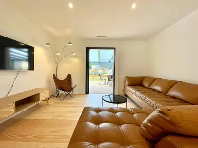 Coin salon dans l'établissement Maison moderne idéale famille à 10 mn de la plage