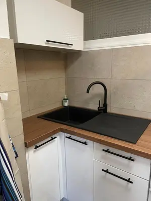 Cuisine ou kitchenette dans l'établissement LouSangla