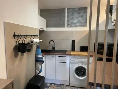 Cuisine ou kitchenette dans l'établissement LouSangla
