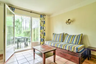 Coin salon dans l'établissement Les Maisons du Domaine du Golf de Pinsolle - maeva Home - Maison 3 pièces 6 personnes - Sélection MAE-9964