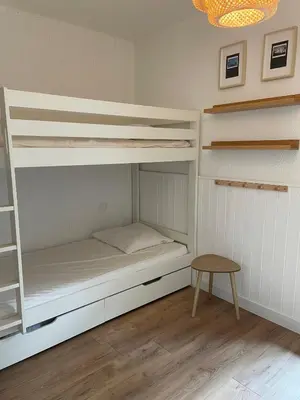 Un ou plusieurs lits dans un hébergement de l'établissement Appartement à Seignosse océan 2 chb et jardin