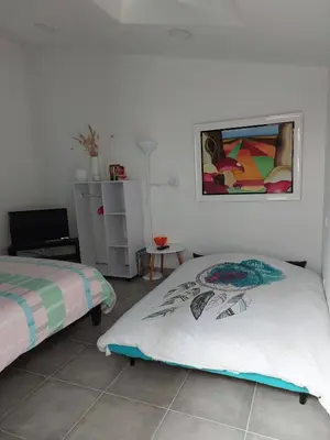 Un ou plusieurs lits dans un hébergement de l'établissement Biscarrosse Bourg - Chez Perli