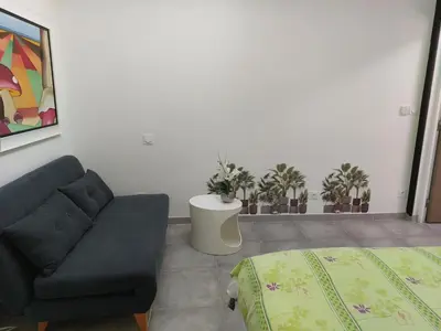 Coin salon dans l'établissement Biscarrosse Bourg - Chez Perli